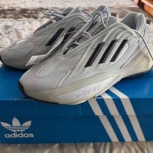 Adidas Men's Gray Sneakers with Black Stripes